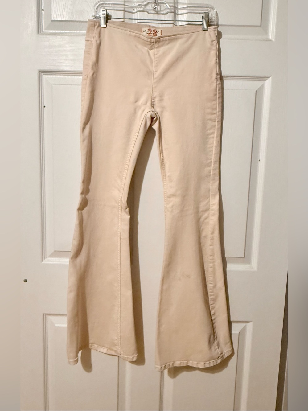 We The Free Cream Flare Jeans